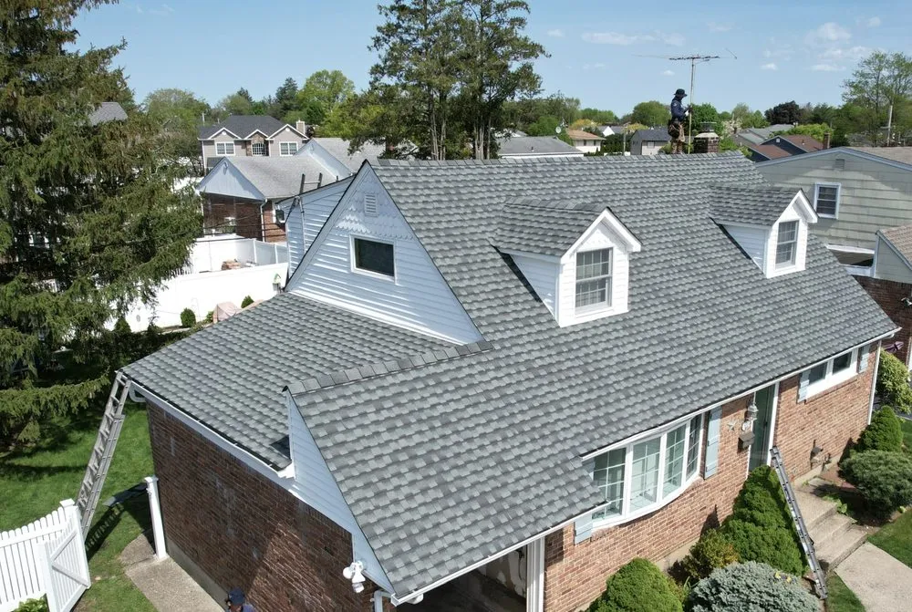 Slide of John Goess Roofing