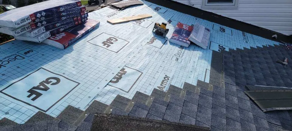 Slide of John Goess Roofing