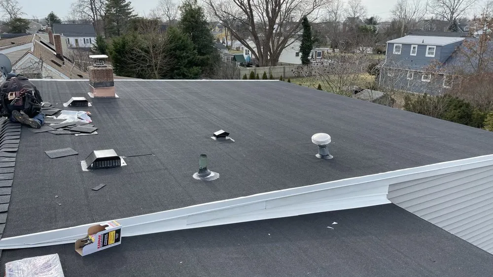 Slide of John Goess Roofing