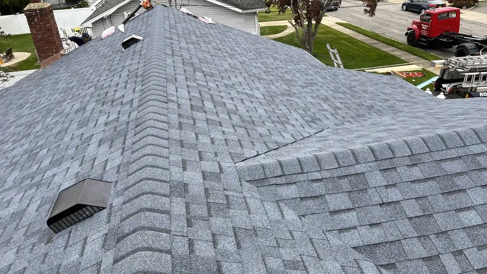 Slide of John Goess Roofing