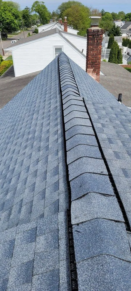 Slide of John Goess Roofing