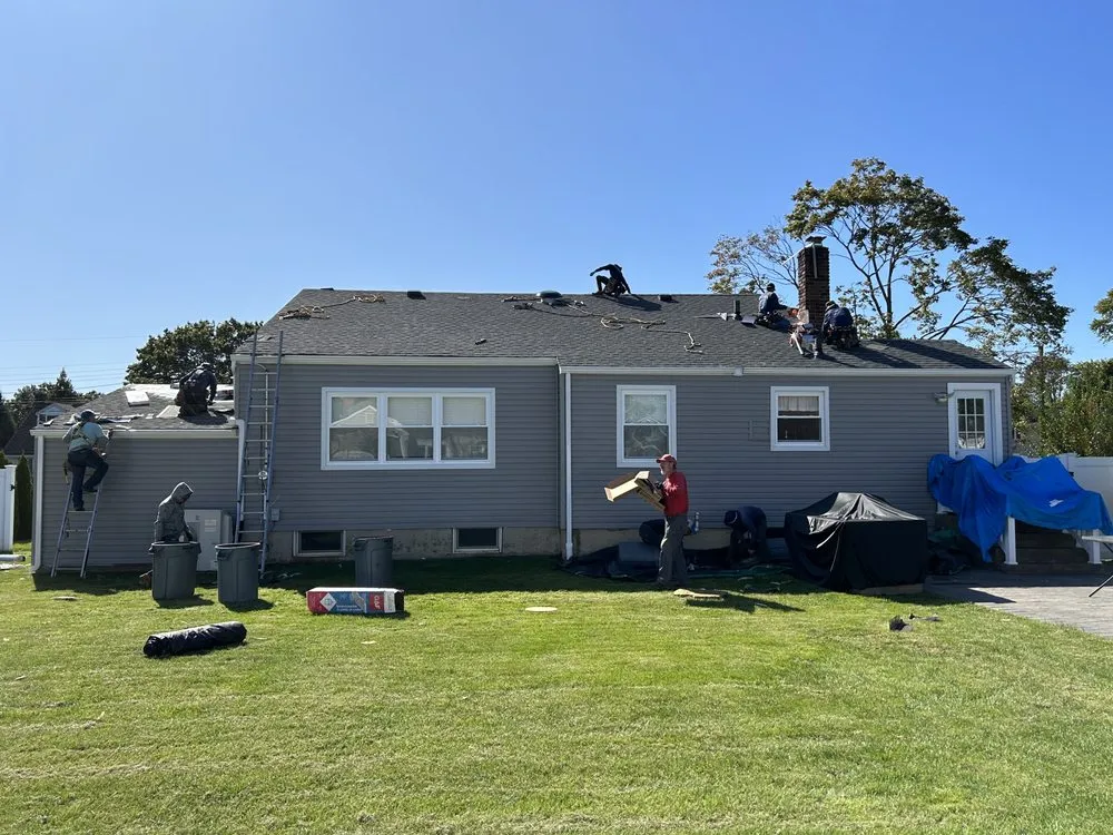 Slide of John Goess Roofing