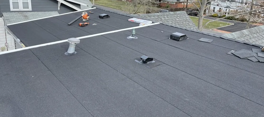 Slide of John Goess Roofing