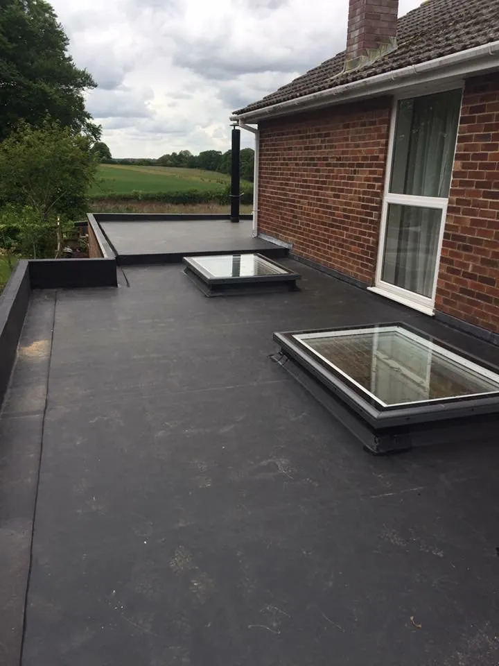 Slide of John Henry Roofing