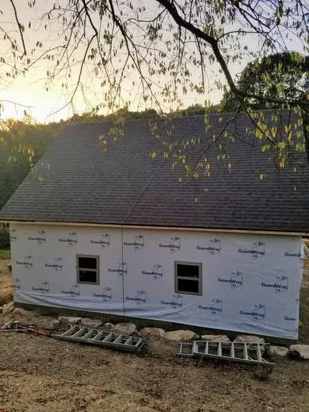 Slide of John Henry Roofing