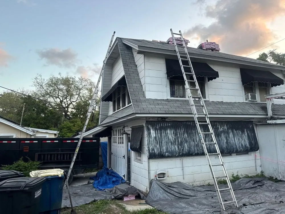 Slide of John Hogan's Roofing