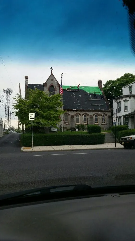 Slide of John King Roofing