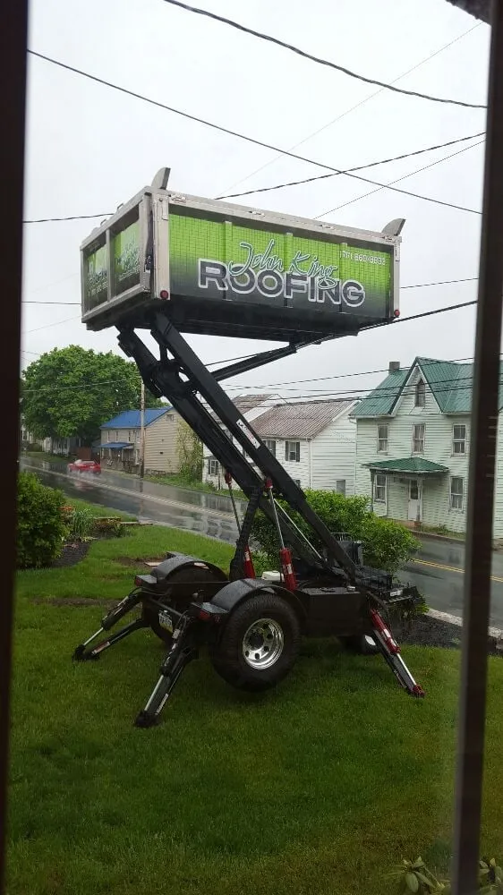 Slide of John King Roofing