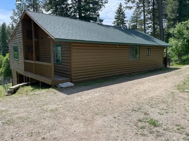 Professional storm damage roof repair in Loon Lake, WA by John Lynch Construction