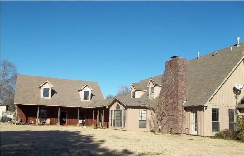 Slide of John M Ward Roofing