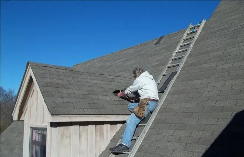 Slide of John M Ward Roofing