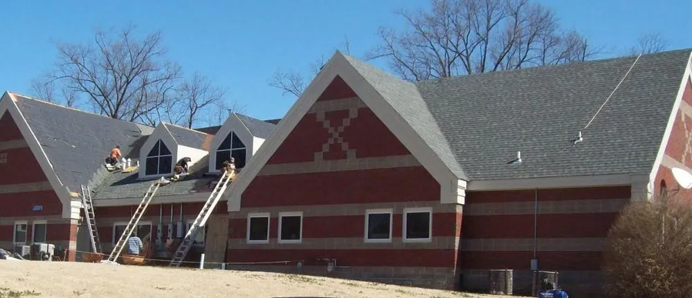 Slide of John M Ward Roofing