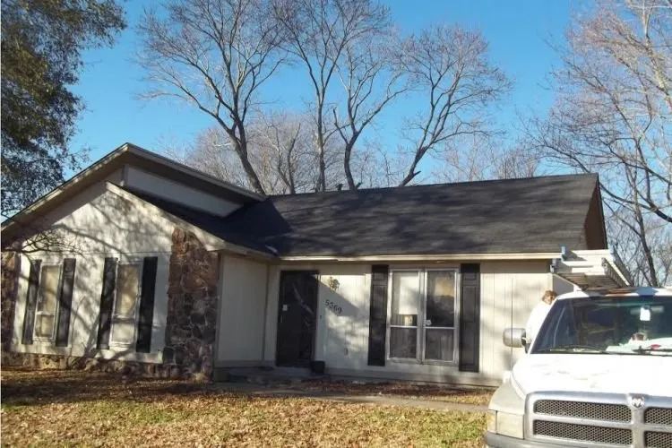 Slide of John M Ward Roofing