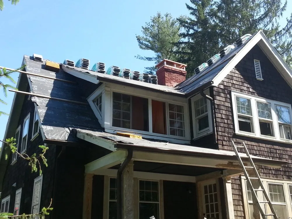 Slide of John McClung Roofing