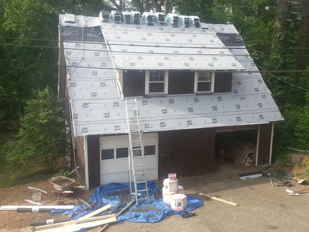 Slide of John McClung Roofing