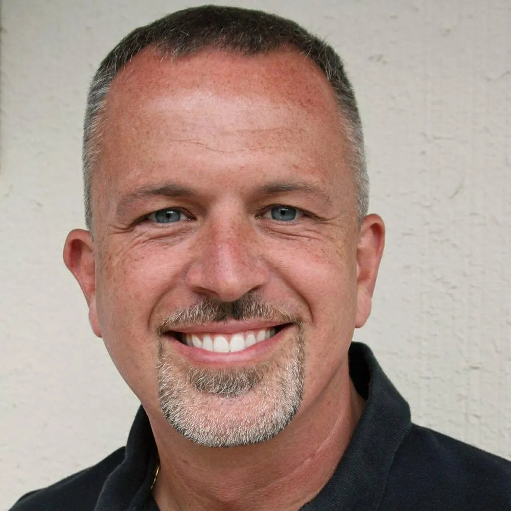 Slide of John McClung Roofing