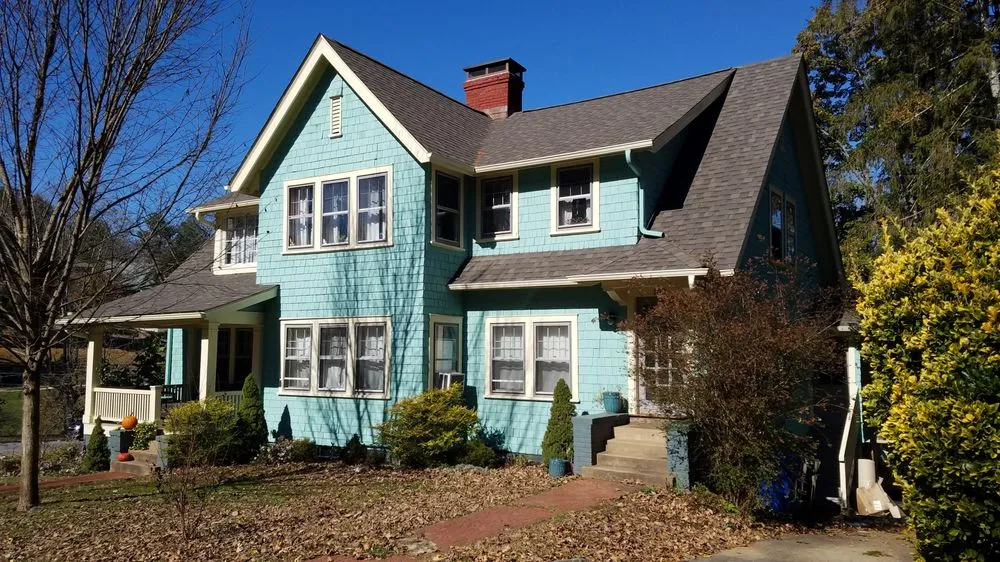 Slide of John McClung Roofing