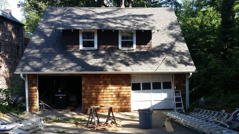 Slide of John McClung Roofing