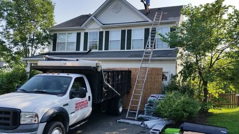 Slide of John Mills Roofing