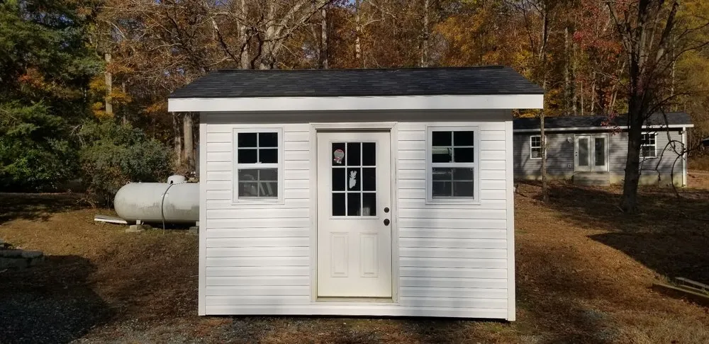 Slide of John Mills Roofing