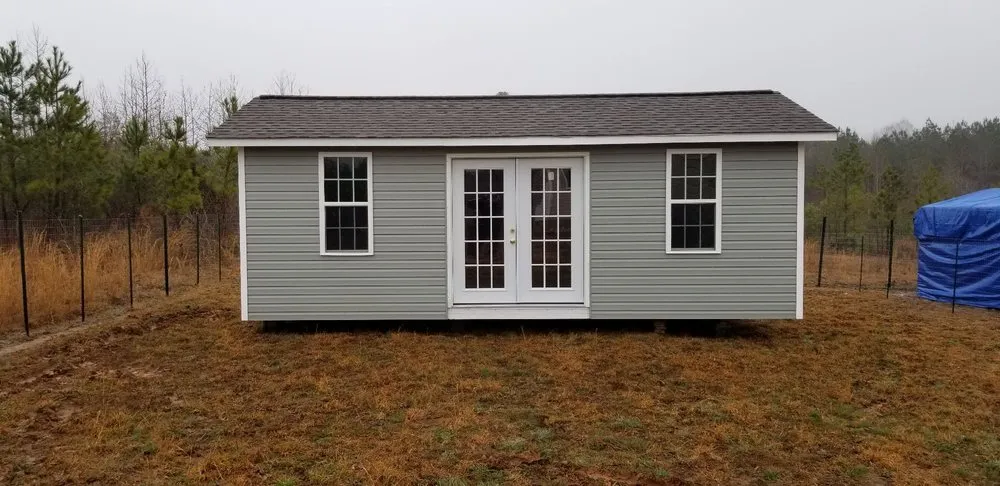 Slide of John Mills Roofing