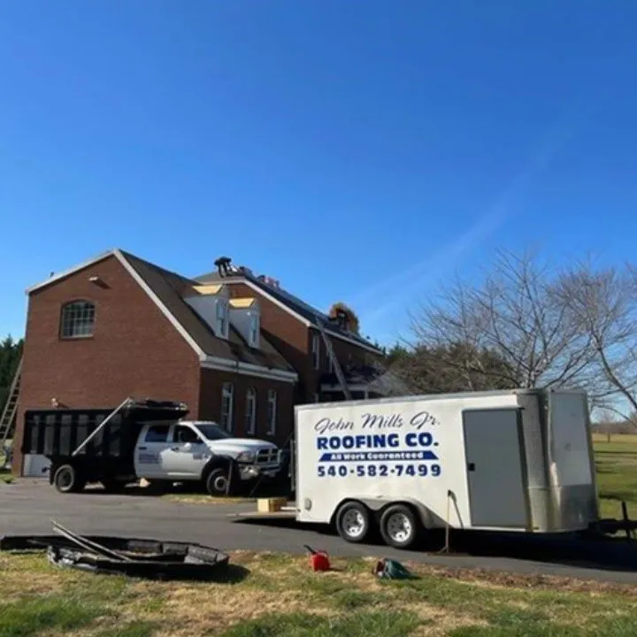 Slide of John Mills Roofing