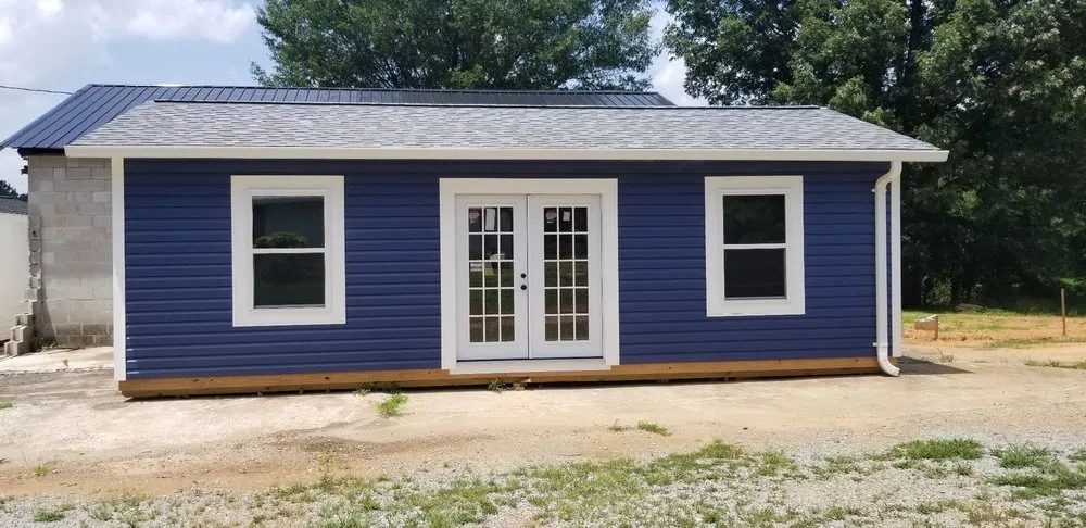 Slide of John Mills Roofing