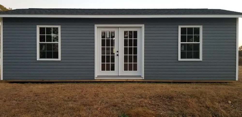 Slide of John Mills Roofing