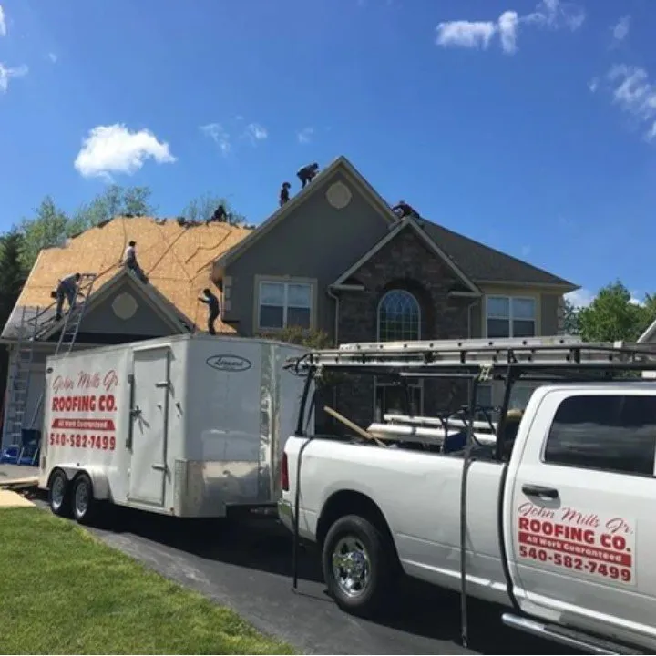 Slide of John Mills Roofing