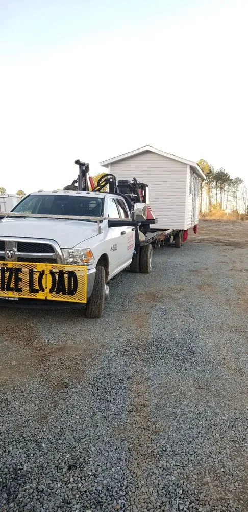 Slide of John Mills Roofing