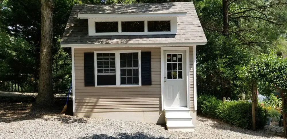 Slide of John Mills Roofing