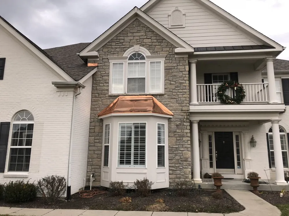 Slide of John Peters Roofing