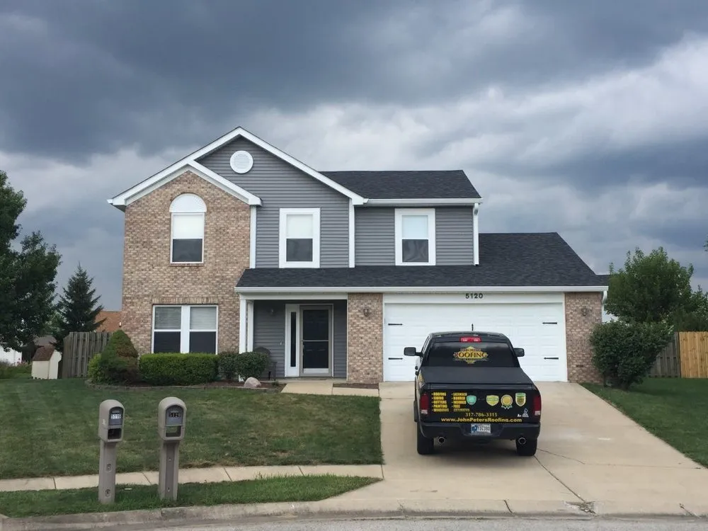 Slide of John Peters Roofing