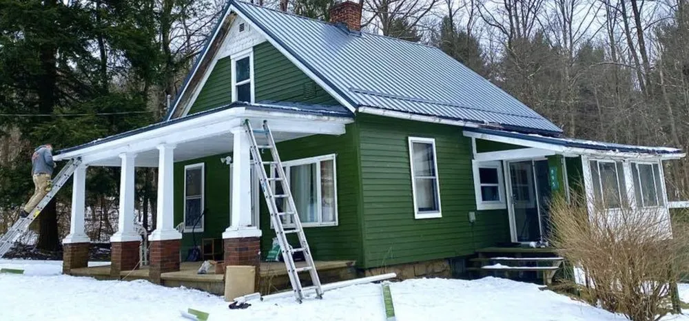 Slide of John Pleger Roofing