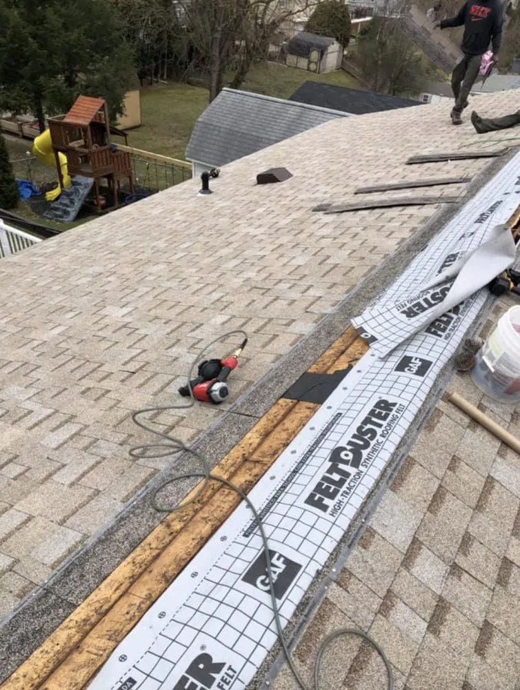 Slide of John Pleger Roofing