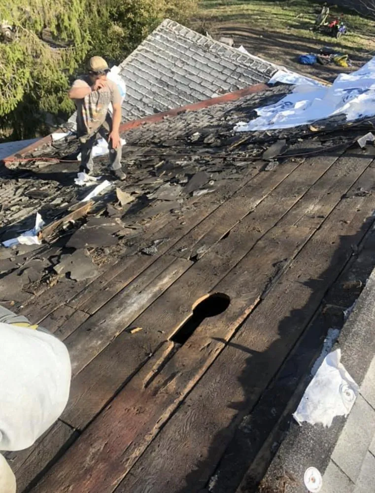 Slide of John Pleger Roofing