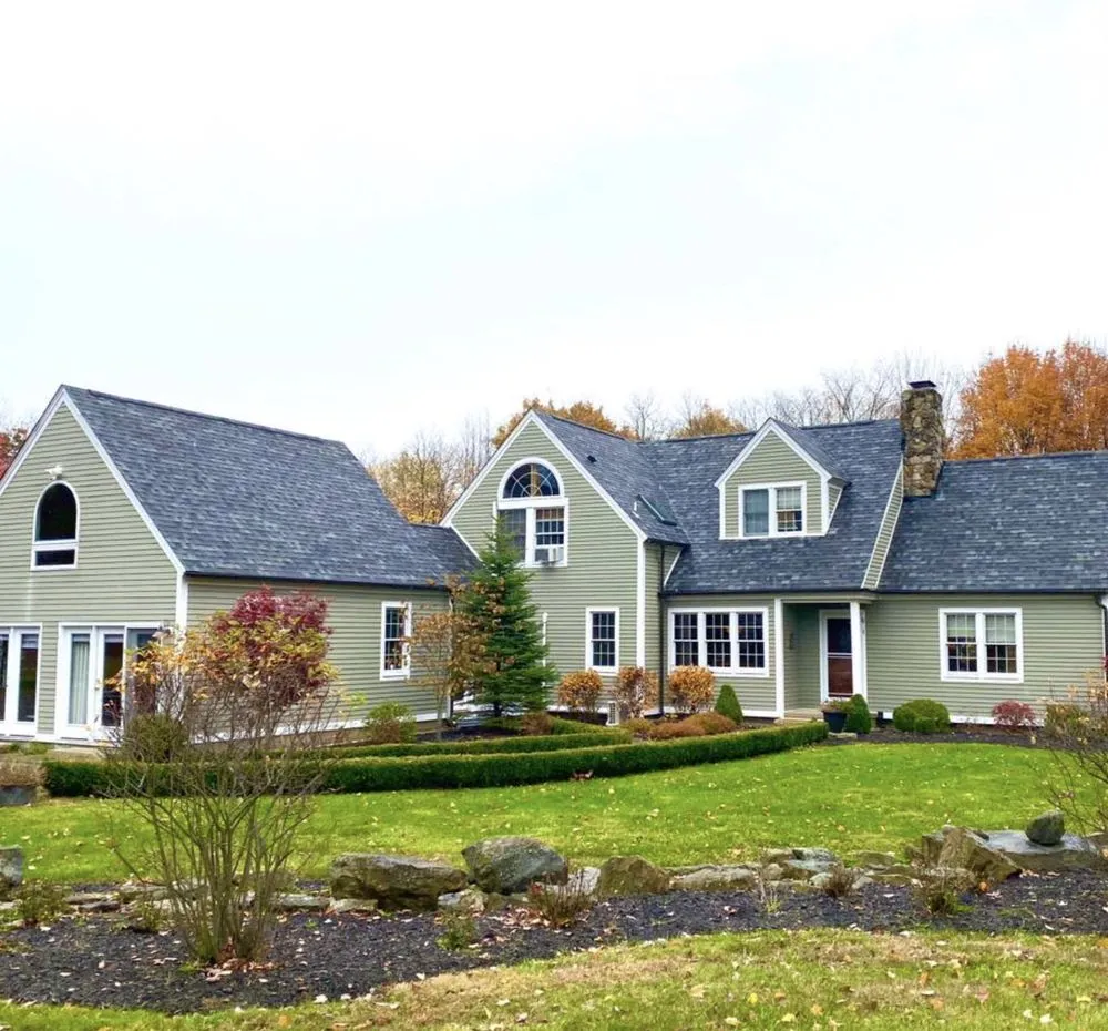 Slide of John Pleger Roofing