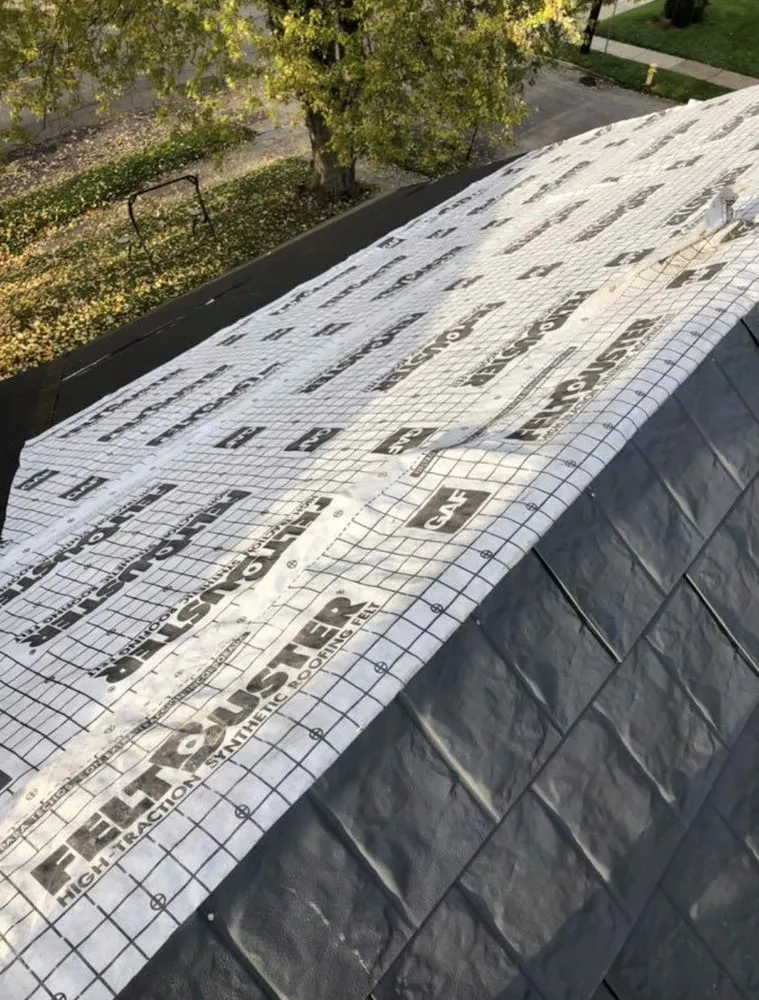 Slide of John Pleger Roofing