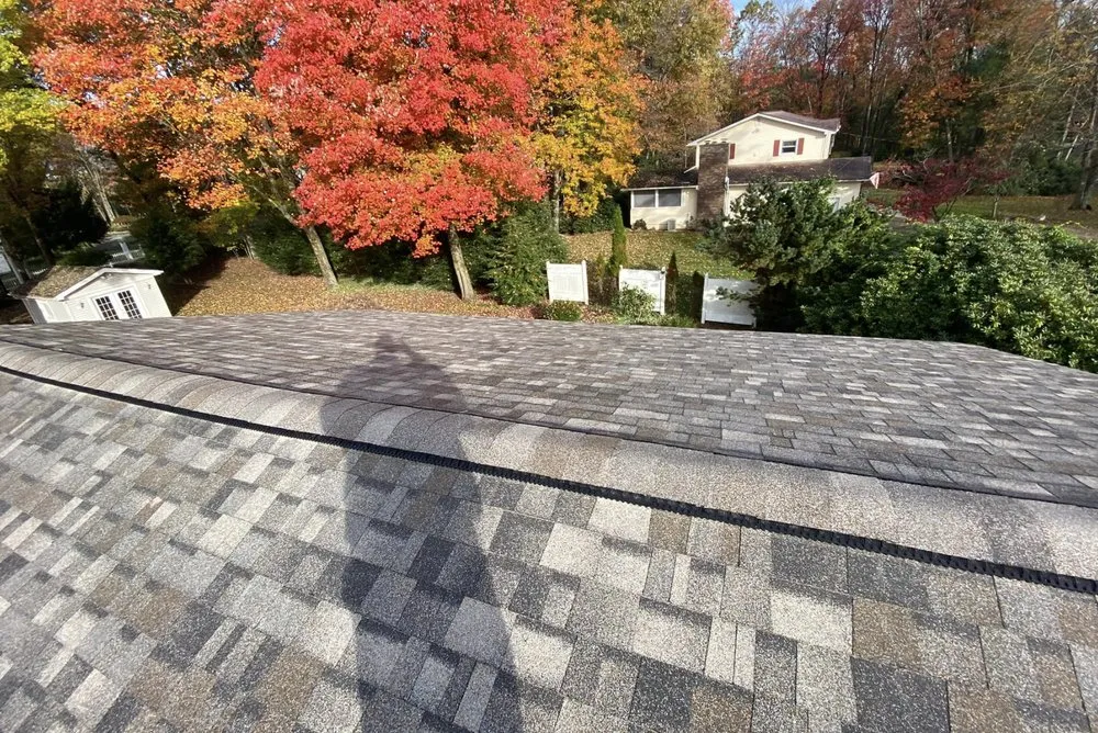 Slide of John Pleger Roofing