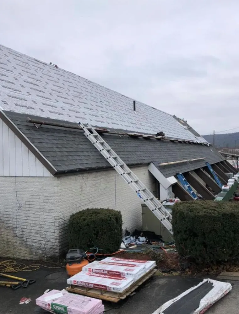 Slide of John Pleger Roofing