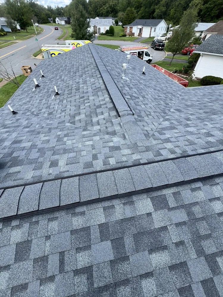 Slide of John R Guzzi Roofing