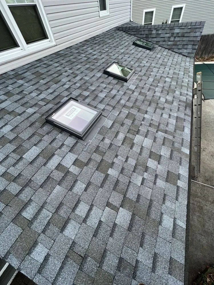 Slide of John R Guzzi Roofing