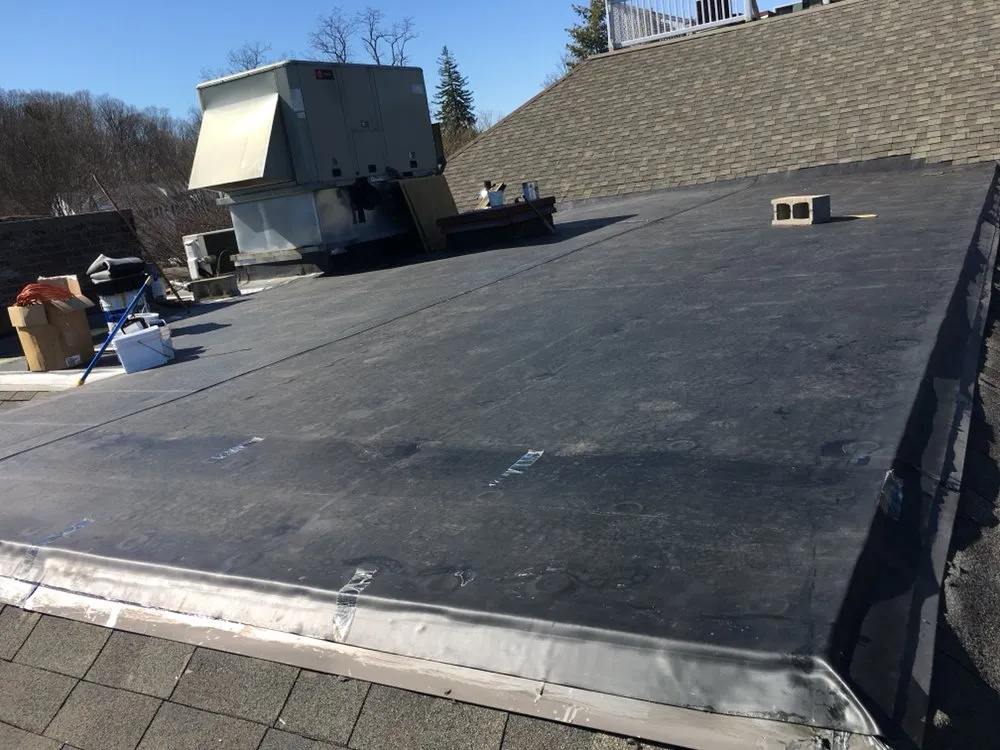 Slide of John Roofing