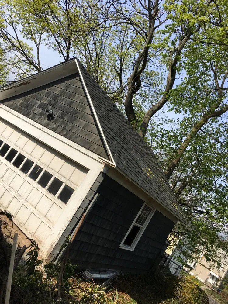 Slide of John Roofing