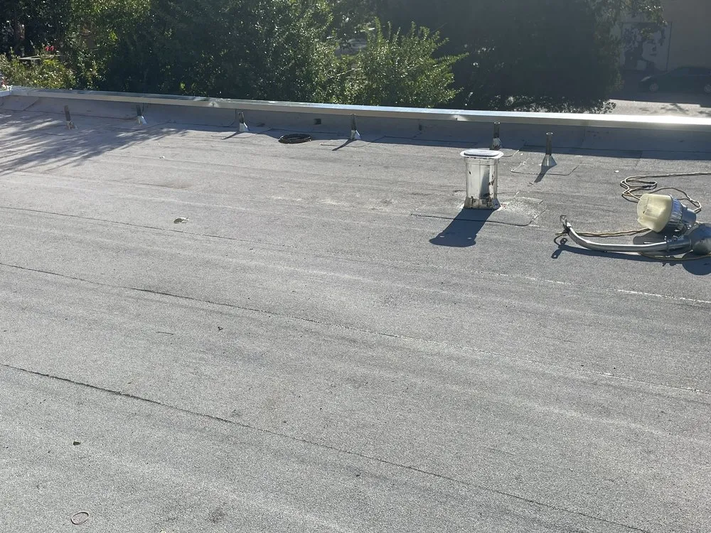 Slide of John Stahl Roofing