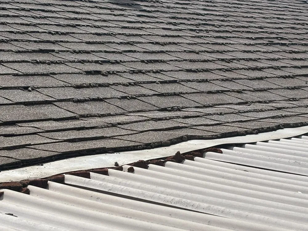 Slide of John Stahl Roofing