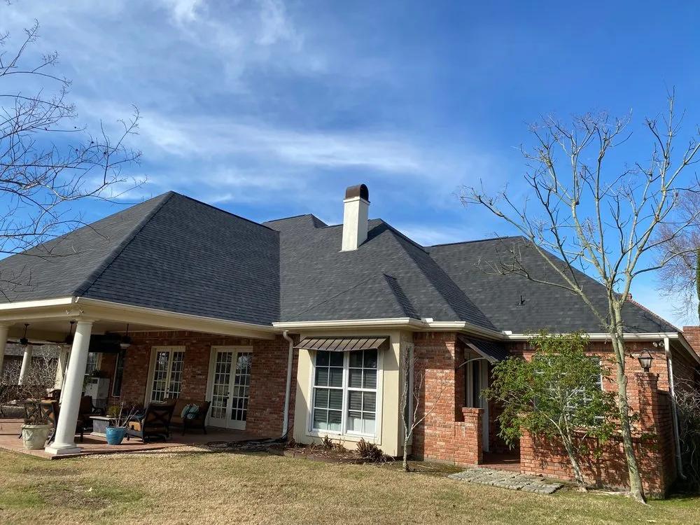 Slide of John Theriots Roofing