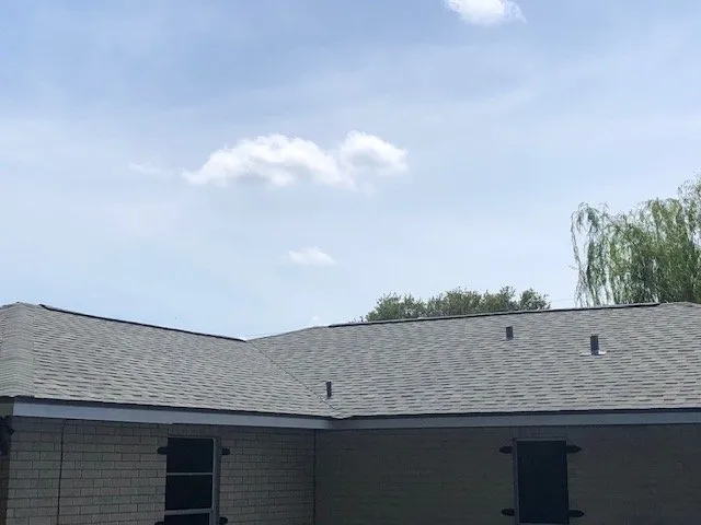 Slide of John Theriots Roofing