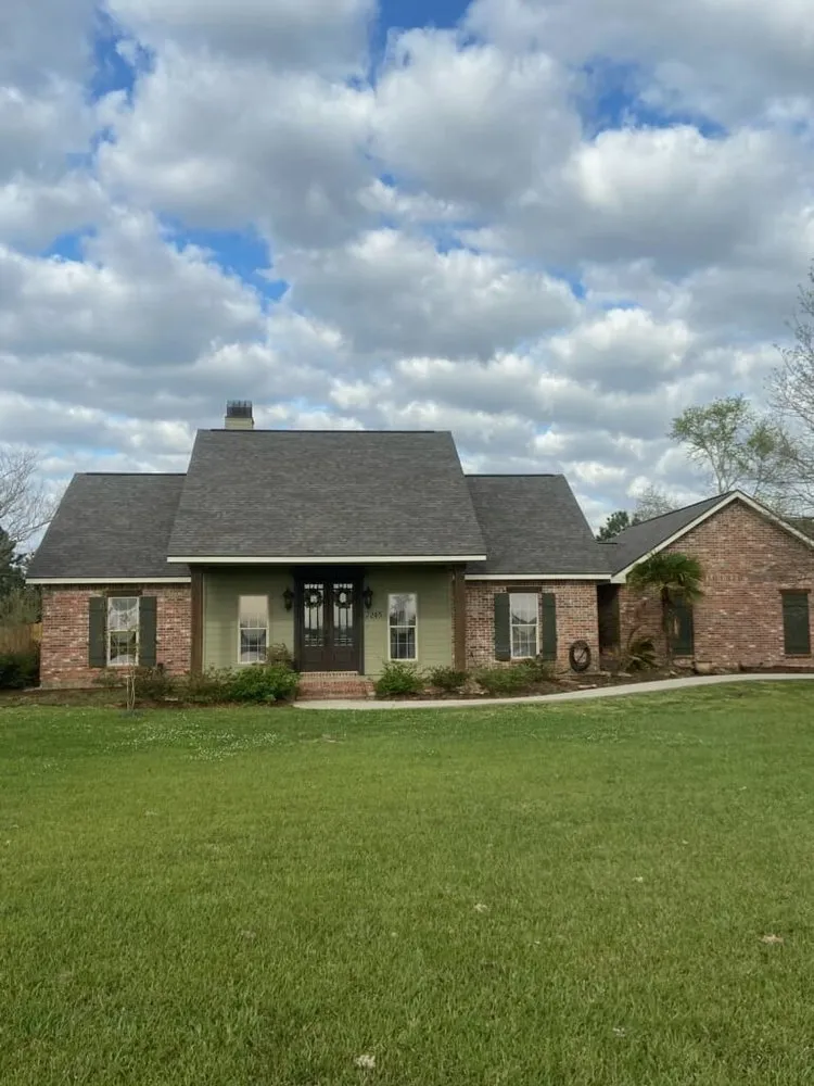 Slide of John Theriots Roofing