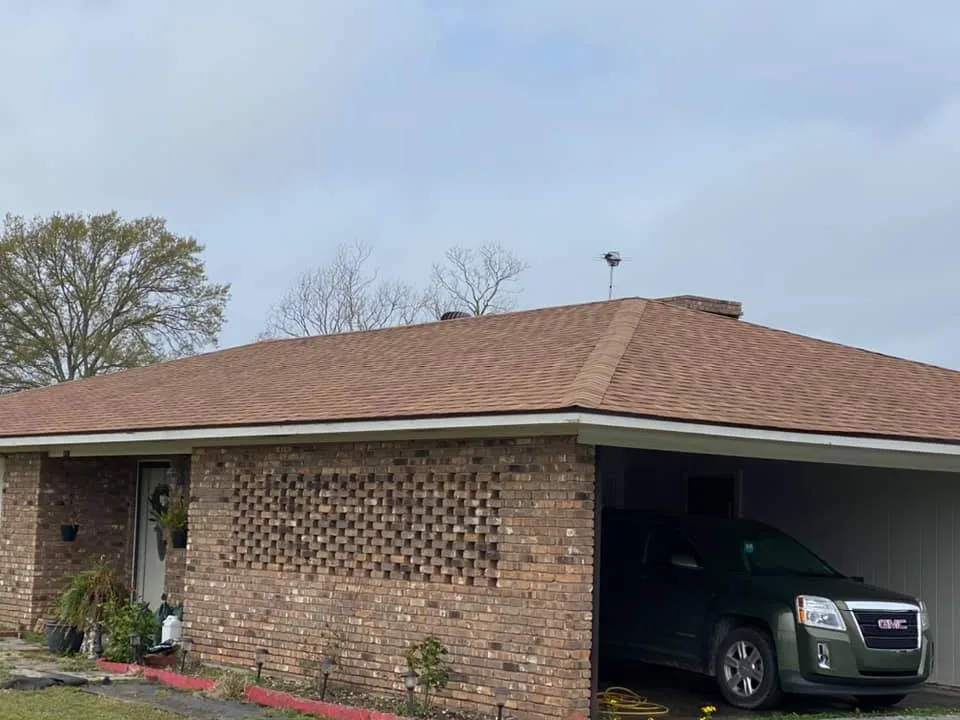 Slide of John Theriots Roofing